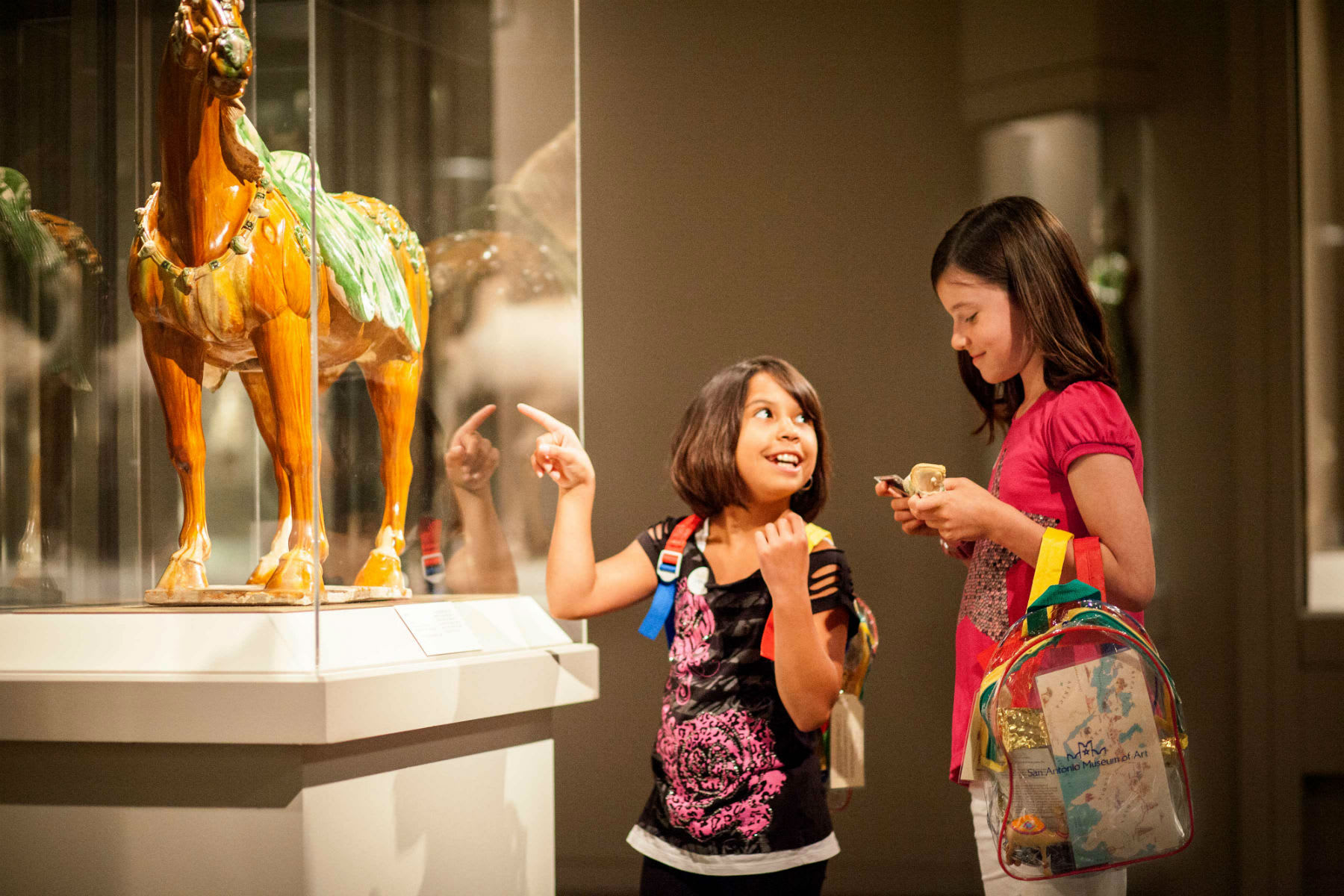 Image of Indoors, Museum, Child, Female, Girl, Person, Accessories, Bag, Handbag, Adult, Woman, Backpack, Bride, 