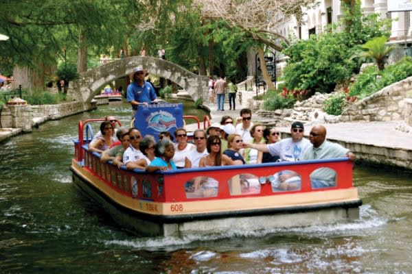 Image of Canal, Outdoors, Water, Boat, Vehicle, People, Person, Adult, Male, Man, Boating, Water Sports, Hat, 