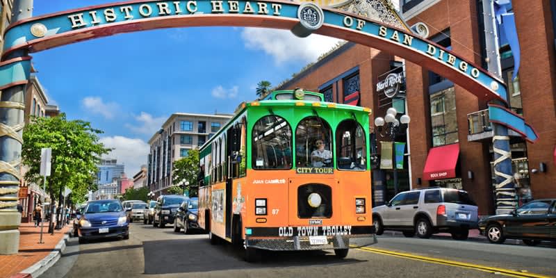 Image of City, Car, Vehicle, Neighborhood, Person, Urban, Bus, Road, Street, 