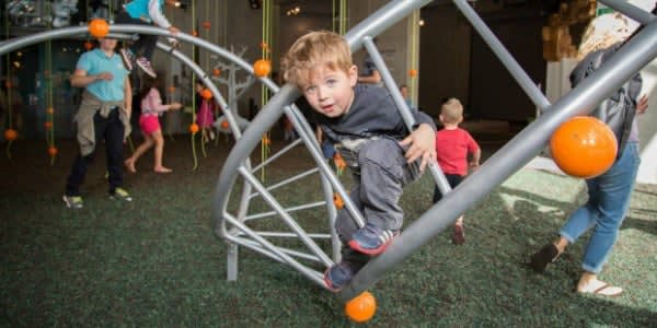 Image of Person, Adult, Female, Woman, Boy, Child, Male, Shoe, Man, Play Area, Outdoors, Balloon, 