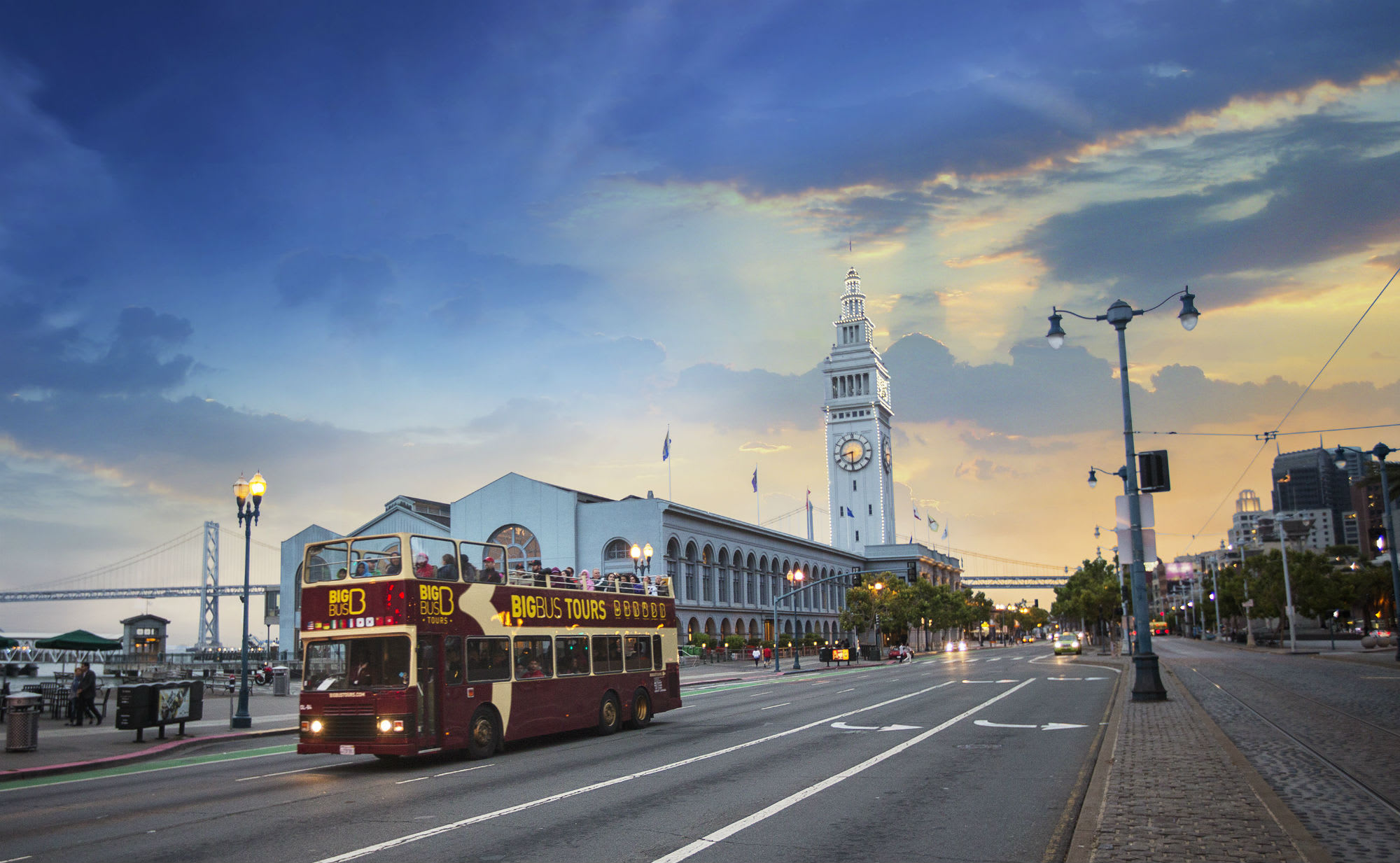 Image of Clock Tower, Tower, City, Road, Car, Vehicle, Metropolis, Urban, Bus, Person, 