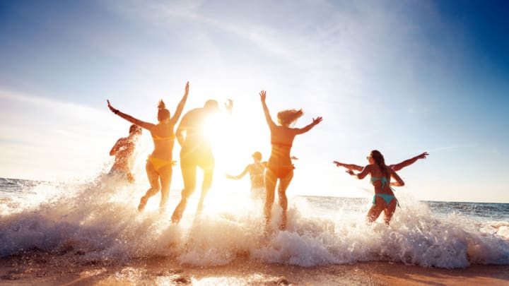Image of Fun, Vacation, Child, Female, Girl, Person, Adult, Male, Man, Summer, Swimwear, Nature, Outdoors, Sea, Water, Sky, Beach, Coast, Shoreline,