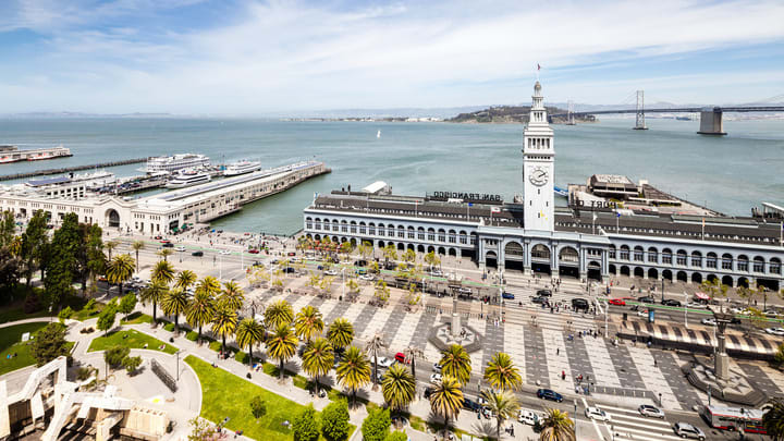 Image of Water, Waterfront, Building, Clock Tower, Tower, City, Metropolis, Urban, Cityscape, Pier, Boat, Car, 