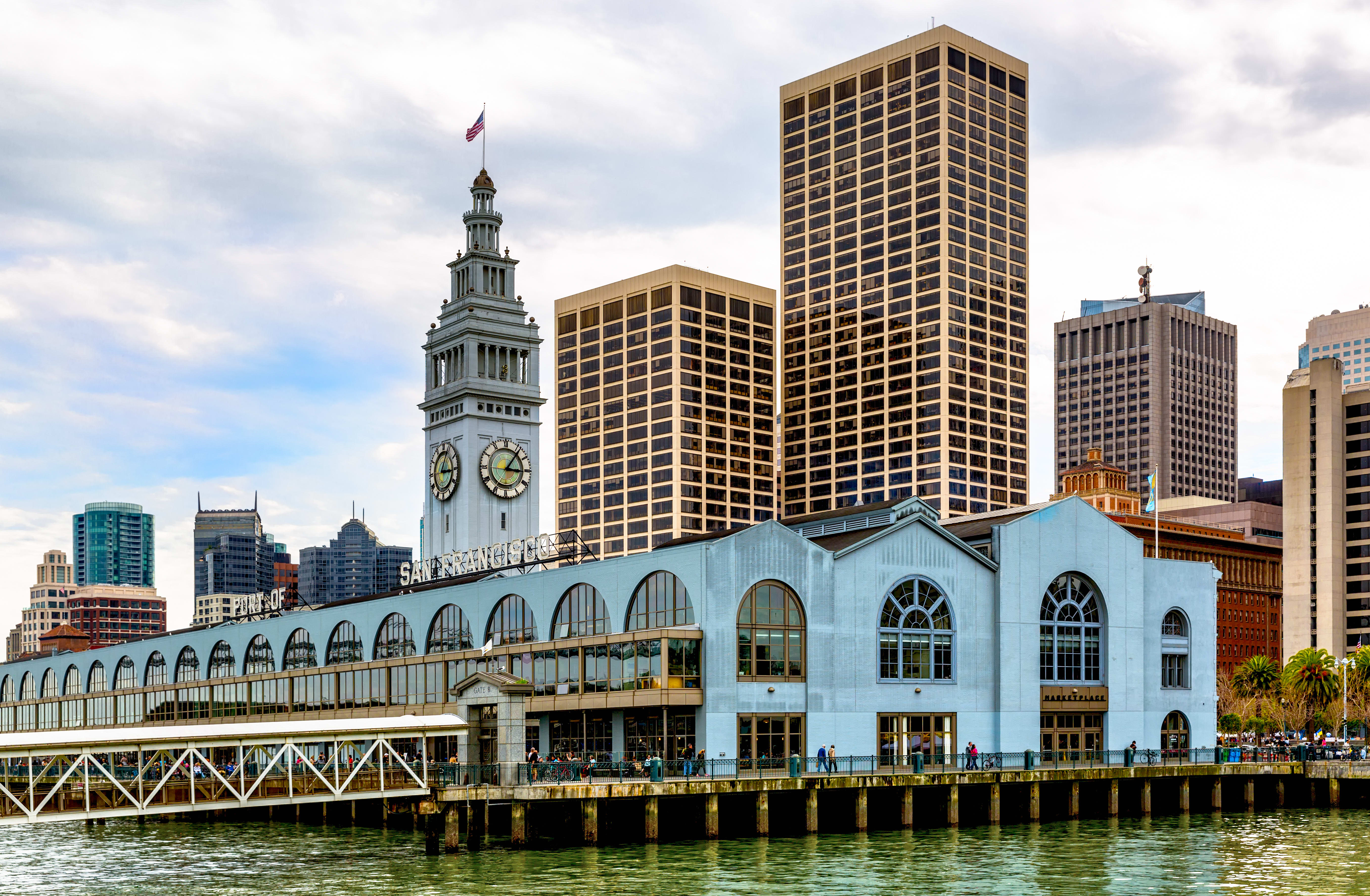 Image of Clock Tower, Tower, City, Metropolis, Urban, Water, Waterfront, Office Building, Cityscape, Spire, Person, 