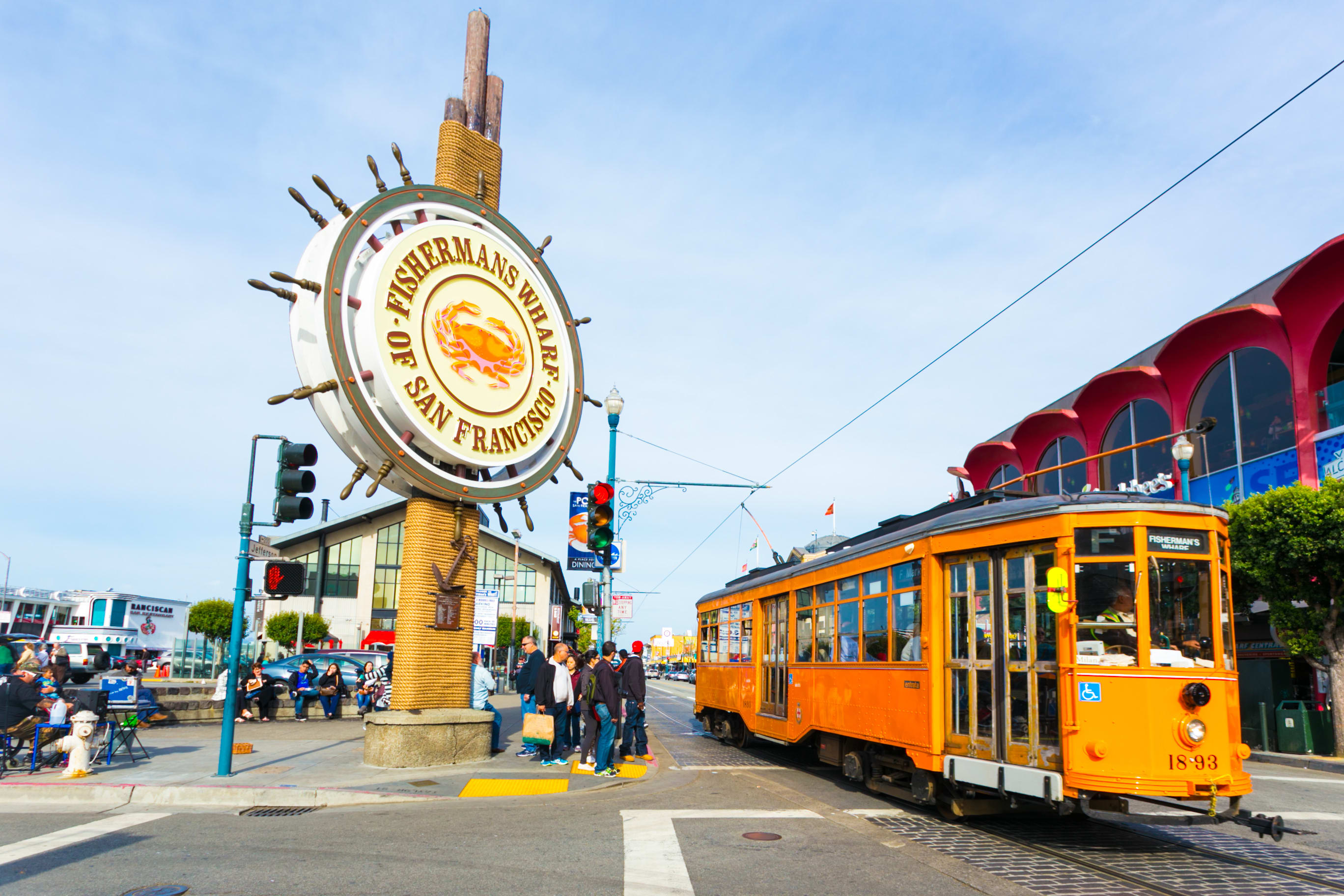 Image of Traffic Light, Person, Handbag, Cable Car, Vehicle, Bus, Chair, 