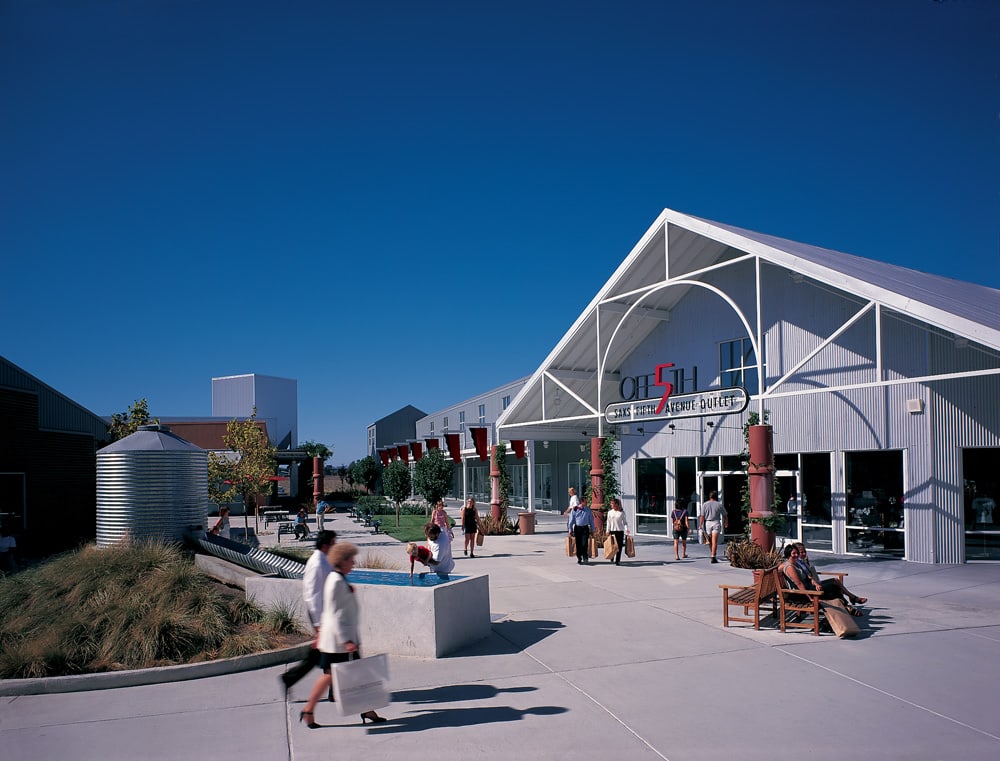 Image of Shorts, Person, Walking, Building, Outdoors, Shelter, Office Building, 