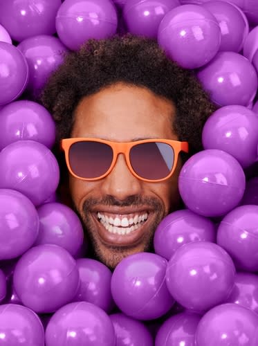 Image of Purple, Accessories, Sunglasses, Face, Happy, Head, Person, Smile, Glasses, Photography, Portrait, Adult, Male, Man, Sphere, Balloon, 