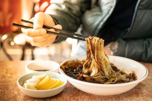 Image of Food, Meal, Dish, Bowl, Adult, Male, Man, Person, Chopsticks, Dining Table, 