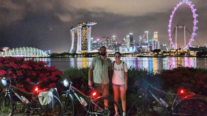 Image of City, Urban, Metropolis, Cityscape, Bicycle, Vehicle, Photography, Person, Adult, Male, Man, Nature, Night, Outdoors, Shoe, Lighting, Face, Head, Portrait, 