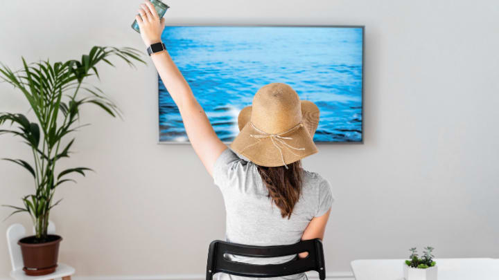 Image of Hat, Sun Hat, Plant, Adult, Female, Person, Woman, Chair, Furniture, 