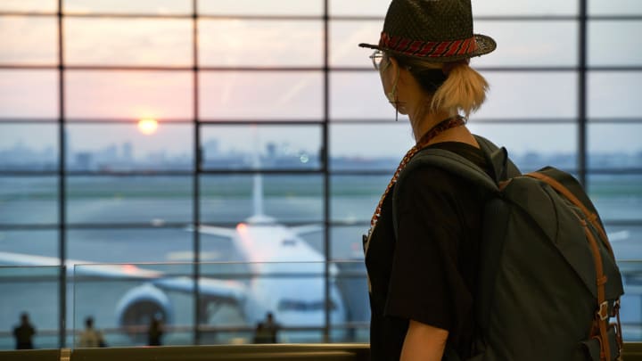 Image of Airport, Adult, Female, Person, Woman, Hat, Terminal, Bag, Backpack, 