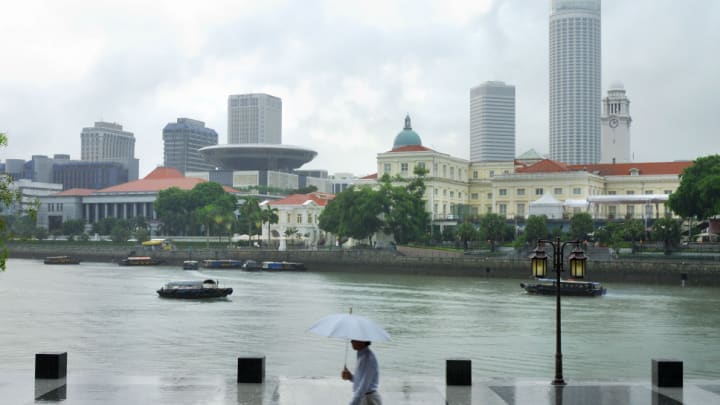 Image of City, Metropolis, Urban, Water, Waterfront, Office Building, Boat, Vehicle, Person, Condo, Housing, High Rise, Handbag, Cityscape, Downtown, Watercraft,