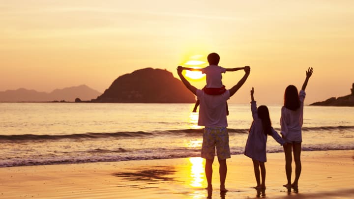 Image of Nature, Outdoors, Sky, Beach, Coast, Sea, Shoreline, Water, Shorts, Sun, Person, Child, Female, Girl, Photography, Summer, Adult, Male, Man, Sunset, Face, Head, Portrait, Fun, Vacation, 