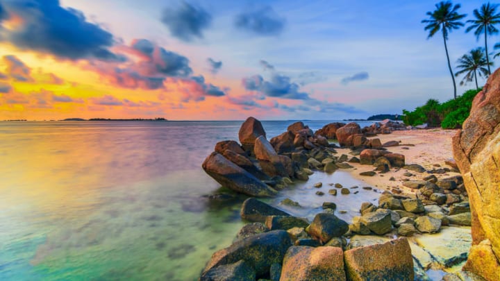 Image of Summer, Rock, Landscape, Nature, Outdoors, Beach, Coast, Sea, Shoreline, Water, Scenery, Sky, Palm Tree, Tree, Tropical, Land, Horizon, Cave, Cove, Vegetation, 