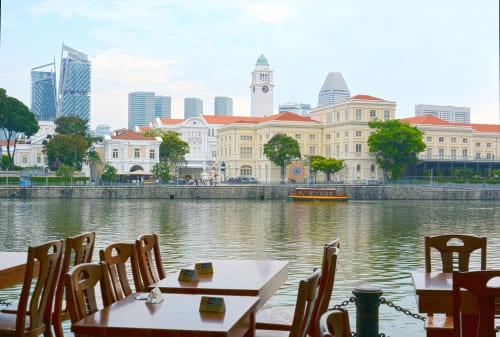 Image of Nature, Outdoors, Scenery, City, Metropolis, Urban, Water, Waterfront, Chair, Furniture, Dining Table, Table, Boat, Cityscape, Lakefront, Dining Room, Indoors, 