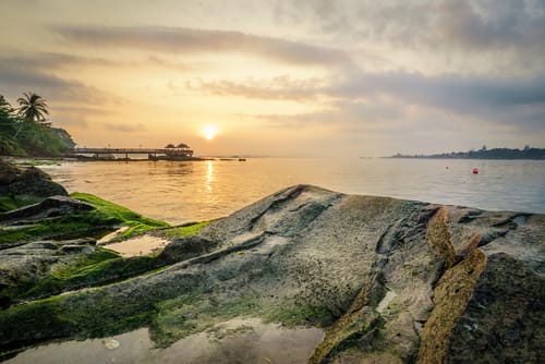 Image of Water, Waterfront, Nature, Outdoors, Sky, Summer, Scenery, Landscape, Rock, Sea, Tree, Land, Vegetation, 