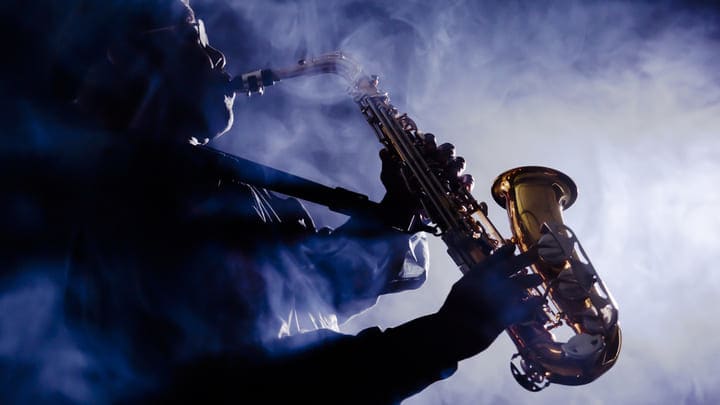 Image of Concert, Crowd, Person, Musical Instrument, Saxophone, Adult, Male, Man, 