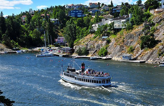 Image of Water, Waterfront, Boat, Ferry, Vehicle, Appliance, Device, Electrical Device, Steamer, Building, Yacht, Outdoors,