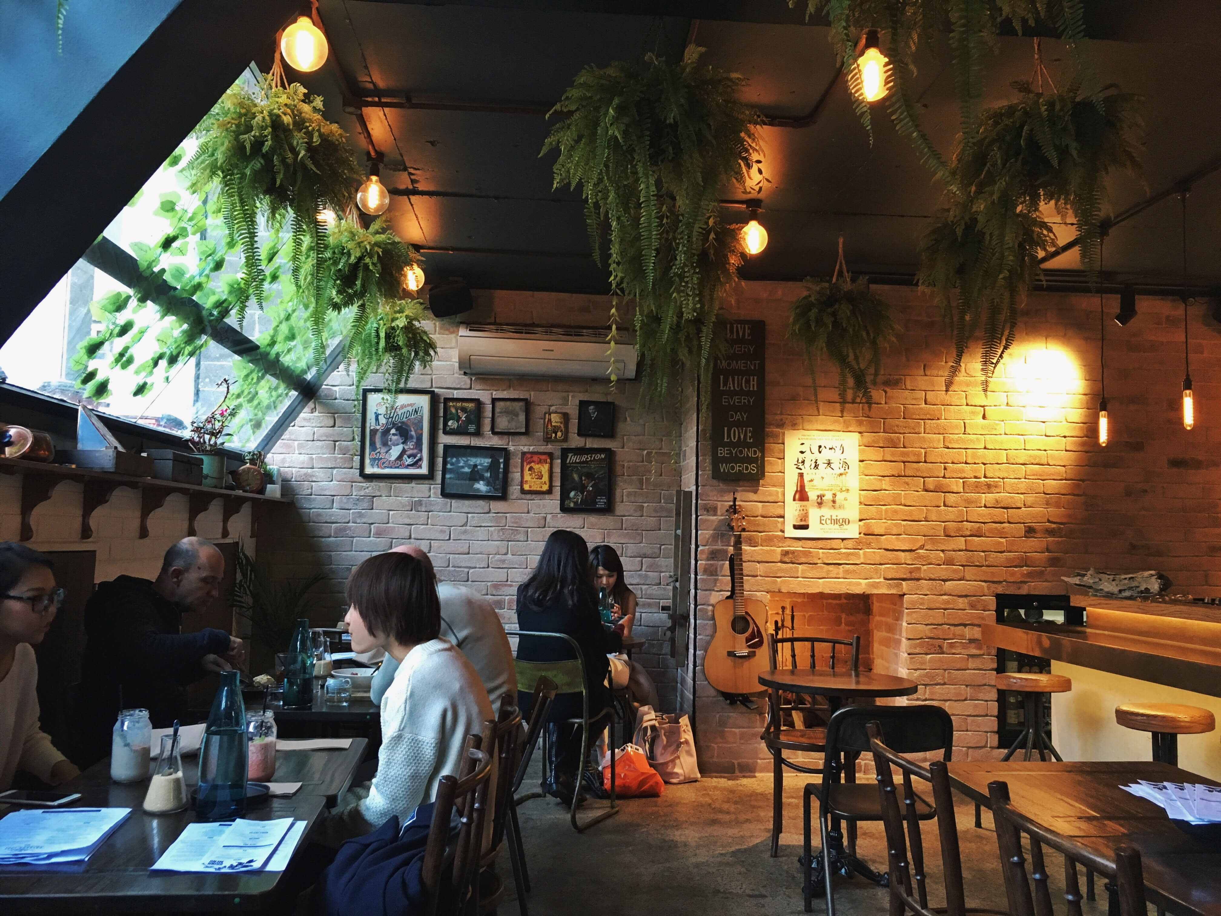 Image of Indoors, Restaurant, Cafe, Cafeteria, Food, Food Court, Wood, Person, Adult, Female, Woman, Male, Man, Dining Table, Furniture, Table, Chair, Handbag, Plant, 