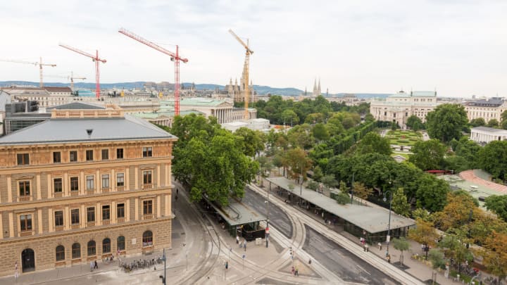 Image of City, Urban, Road, Metropolis, Intersection, Street, Construction, Construction Crane, Office Building, Cityscape, Downtown, Outdoors, 