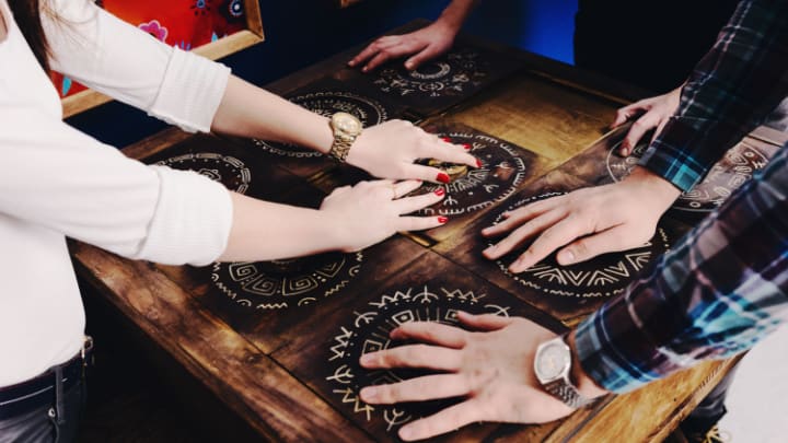 Image of Furniture, Table, Adult, Female, Person, Woman, Male, Man, Finger, Hand, Tabletop, Boy, Child, 