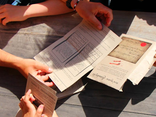 Friends compare clues to solve the mystery.