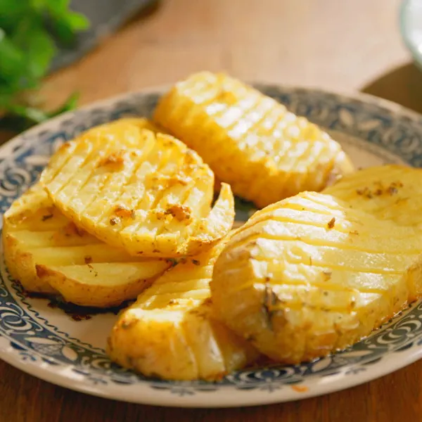 Pommes de terre “accordéon” assaisonnées