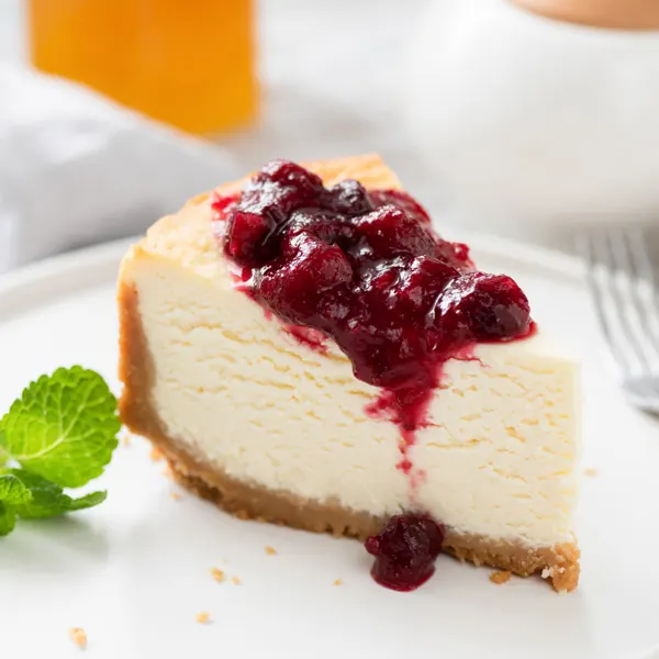 Le meilleur gâteau au fromage (New York cheesecake) et coulis de fraises