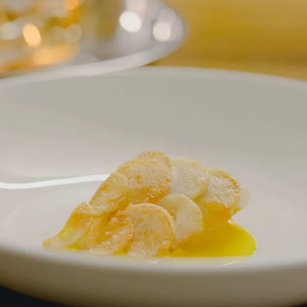Doré de lac en écailles de pommes de terre