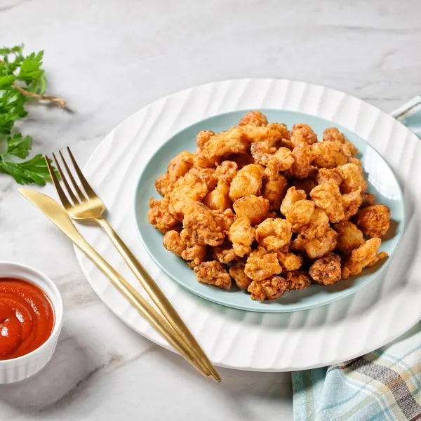 Poulet popcorn et sauce piquante au miel