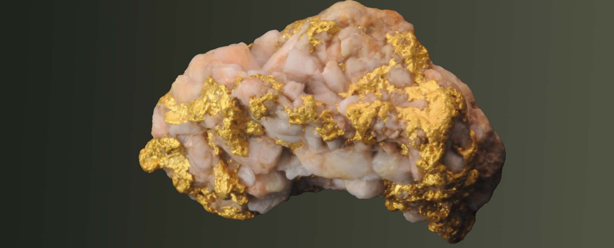 A natural gold nugget with quartz embedded within it