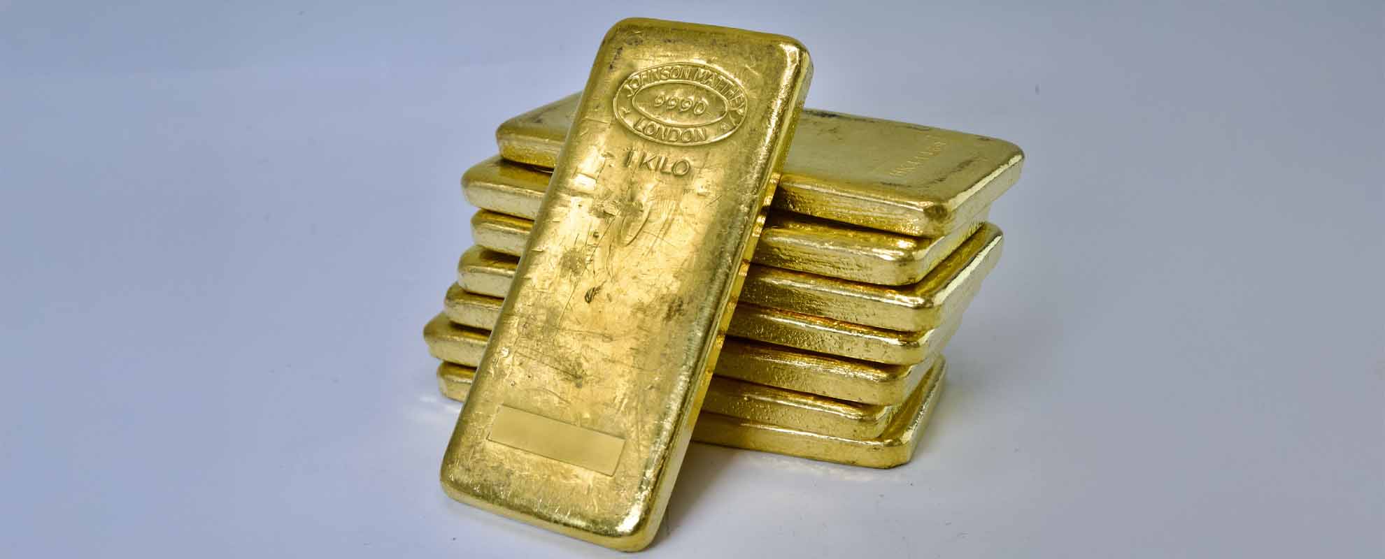 A stack of eight one-kilo pure gold bars