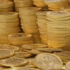 A large pile of bullion grade gold Sovereigns