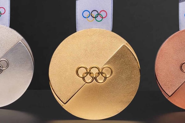The 2026 Olympic gold, silver and bronze medals