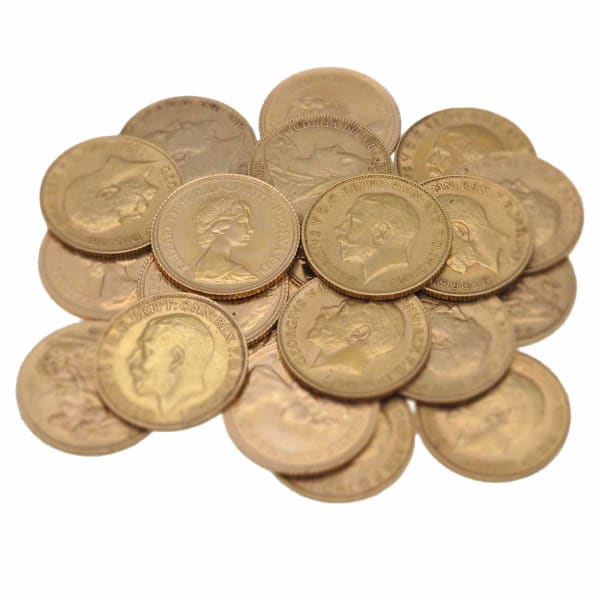 A pile of pre-owned half Sovereign gold bullion coins