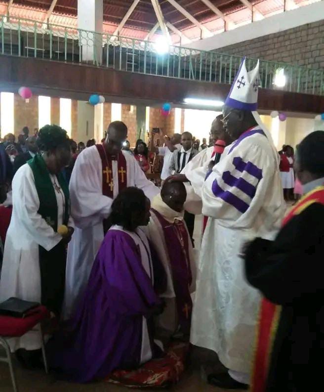 Arch Bishop Dr.kitonga of RGC Consencrating Bsp Daniel Muli , As the First emaw presiding Bishop at Nairobi