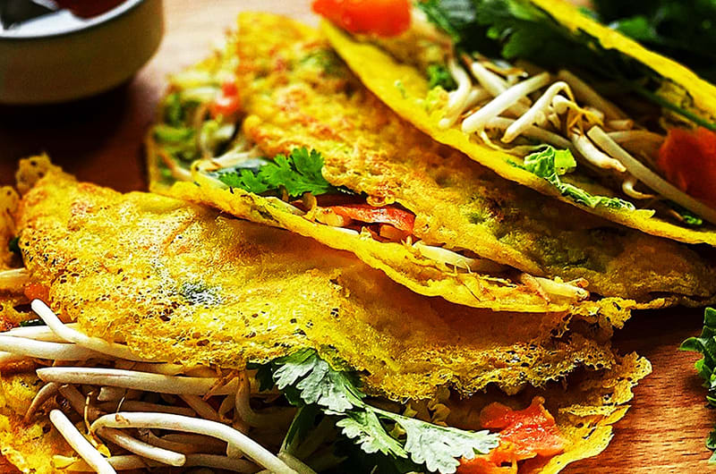 B&aacute;nh kho&aacute;i, một trong những đặc sản nổi bật của TP. Đồng Hới. (Ảnh:B.Ho&agrave;ng)