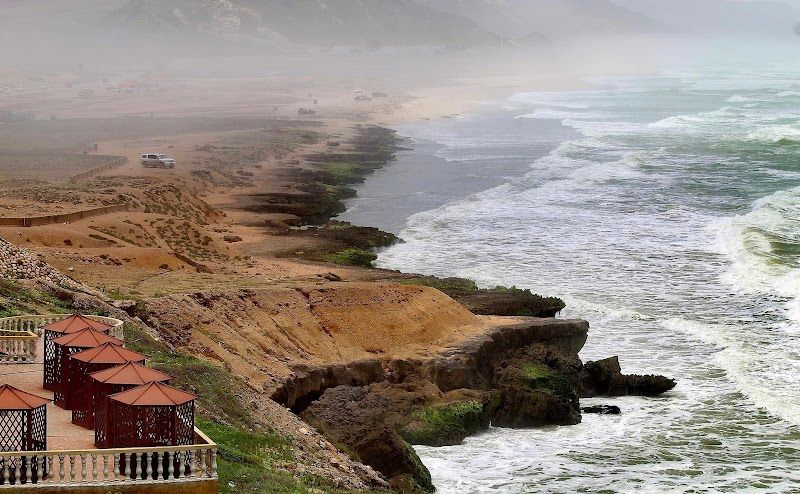 Visit Al Mughsail Beach and Blowholes