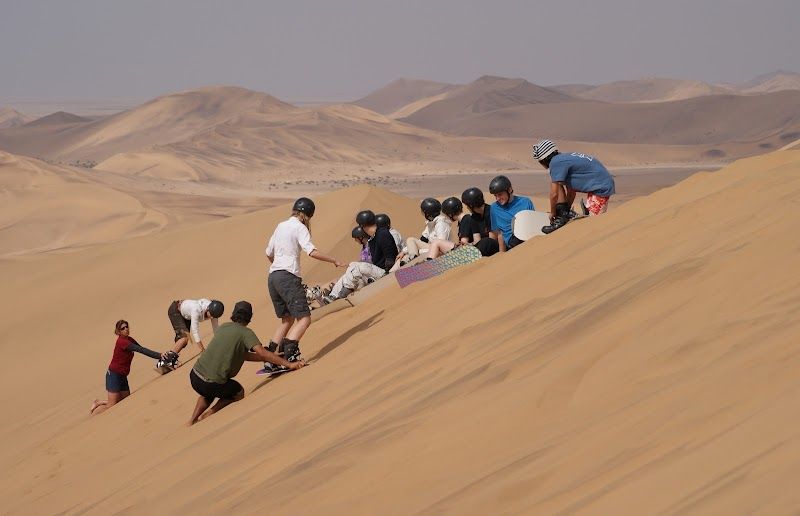Sandboarding on the Namib Desert Dunes