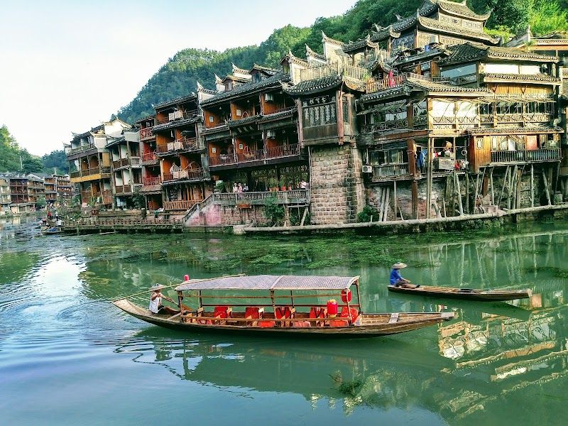Take a boat ride on the Tuojiang River