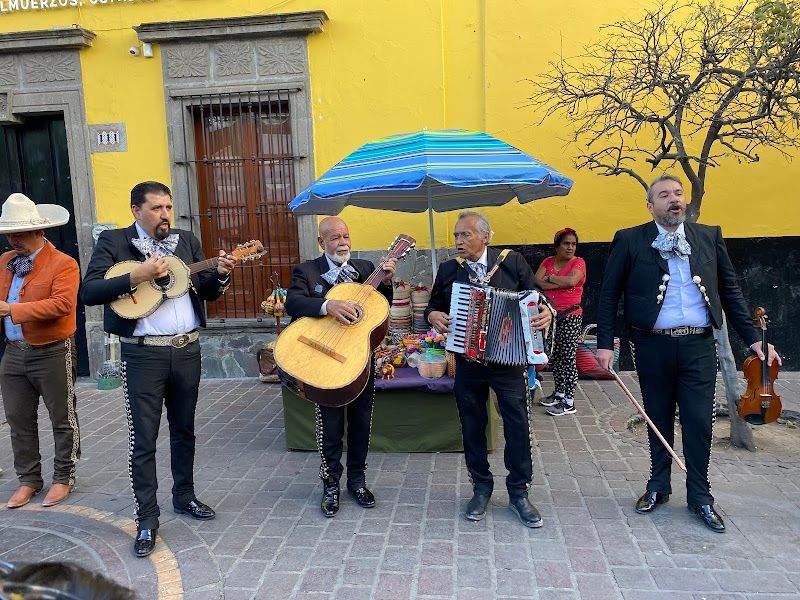 Explore Tlaquepaque for arts, crafts, and mariachi music