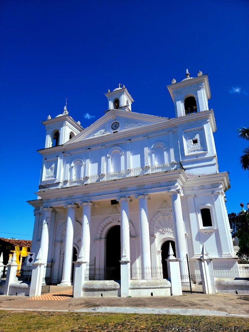 Visit Iglesia Santa Lucía the iconic 19th-century church in the main plaza
