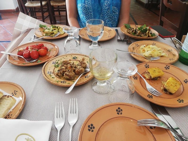 Take a cooking class or enjoy traditional Puglian cuisine at a local trattoria