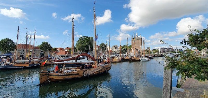 Walk along the old harbor and admire historic ships