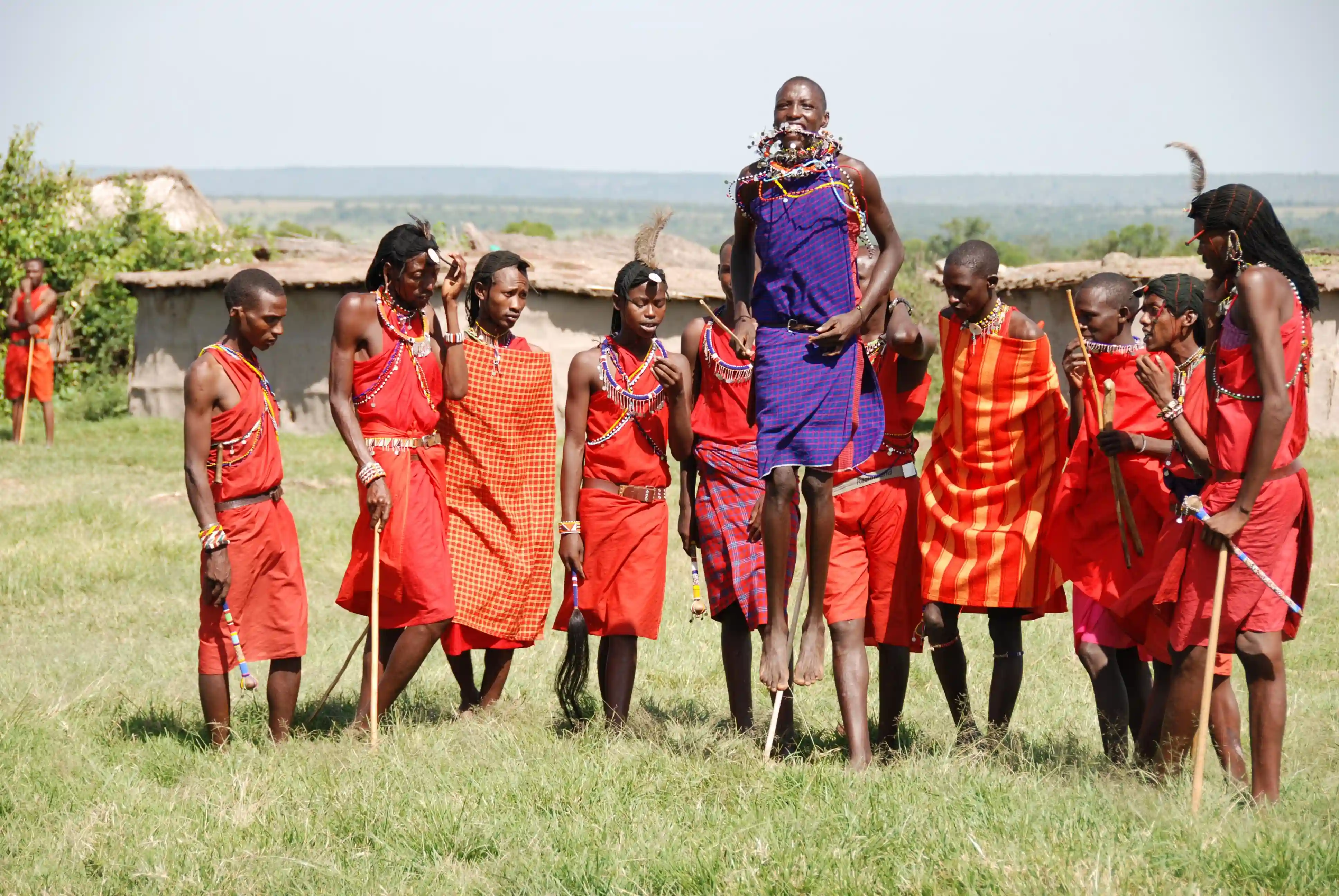 Maasai people performing traditional jumping dance during a cultural experience in Makuyuni, Tanzania safari