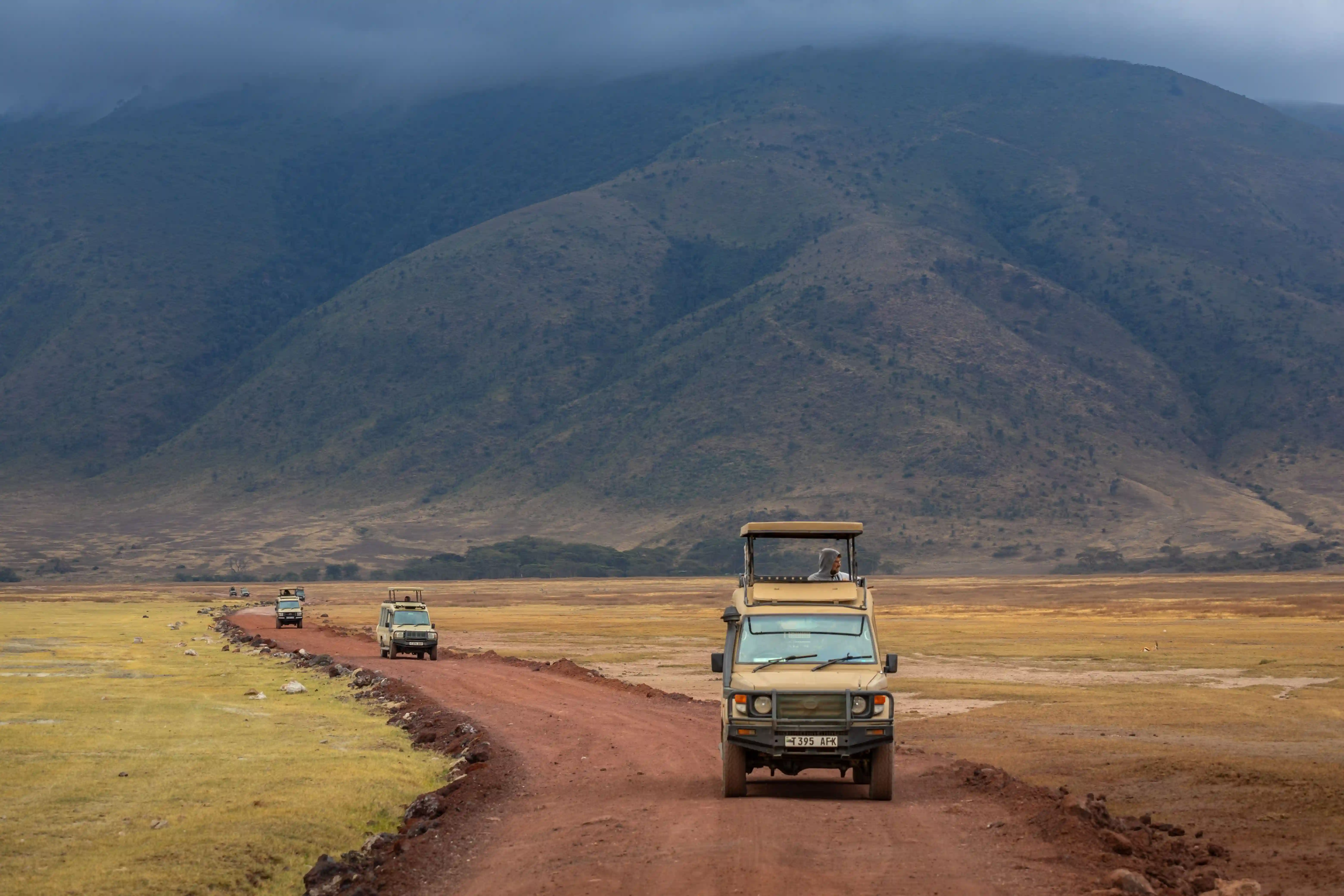 Safari vehicle arriving at Ngorongoro Crater Lake during a Tanzania safari