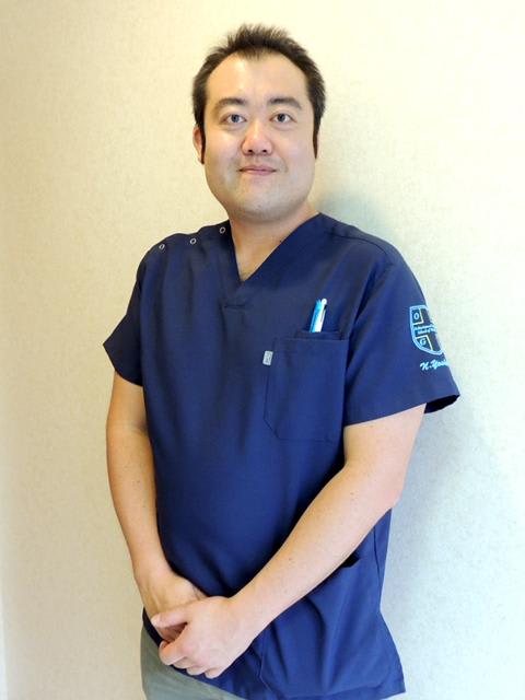 吉岡 範人 理事長