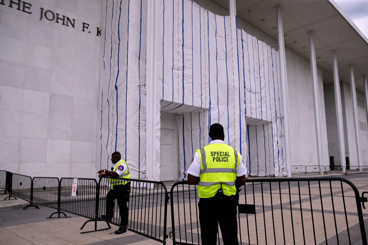 A judge wants to know why one of America’s most famous buildings is hidden behind tarps.