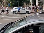 A driver sped into a crowd on a busy London street, leaving five people hurt and a city in shock.