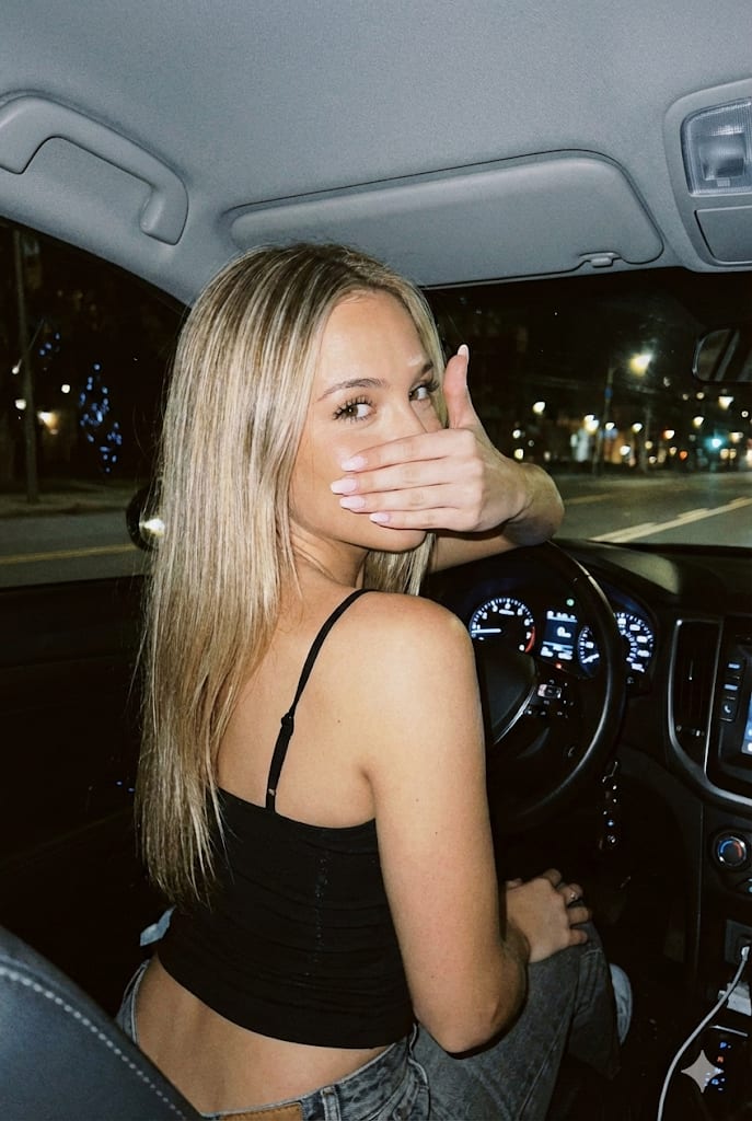 Candid Night Car Selfie with Flash – woman in a car, AI image made with Nano Banana Pro